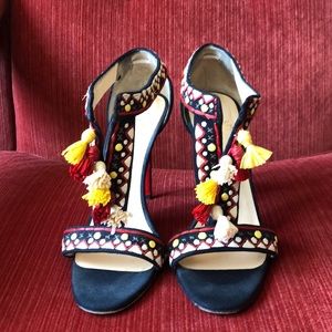 Christian Louboutin pumps with tassels